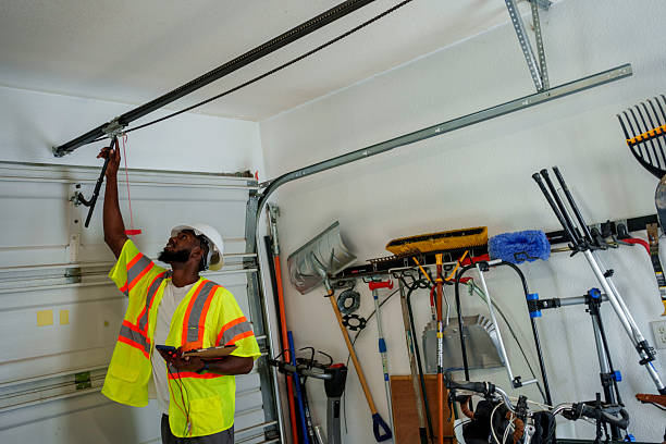 Professional Garage Door Panel Replacement technician working in Saraland, AL